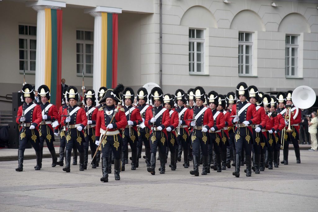 NATO fighter aircraft, 14th c. Honour Guard, Lithuanian Armed Forces Band in reconstructed Grand Duchy of Lithuania period uniforms highlighted commemoration of Statehood Day