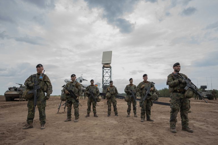  Chancellor of Germany Olaf Scholz visits German military deployed in Lithuania and expresses support to strengthening eastern NATO borders  